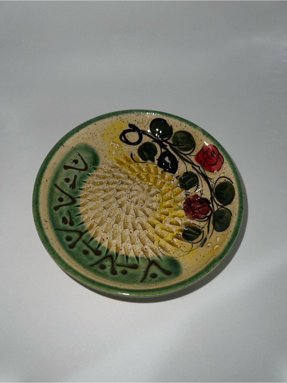 Ceramic plate grater